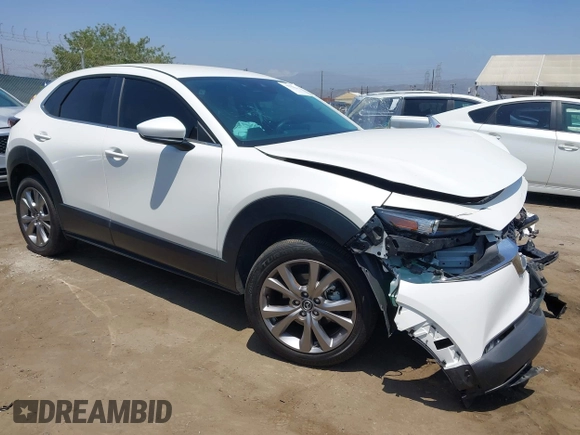 2021 Mazda CX-30 Select with VIN 3MVDMBBL9MM313039, listed as a IAAI auction lot 42575424 with 21,083 mi miles and . Bid and sale history available at DreamBid. Image 1.