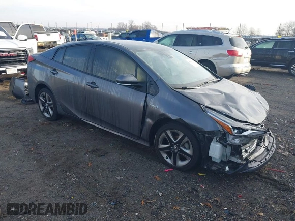 2021 Toyota Prius L Eco z VIN JTDKAMFU1M3149965, wystawiony jako IAAI lot #38641916 z przebiegiem 69 942 mil mil oraz . Historia ofert i sprzedaży dostępna na DreamBid. Obrazek 1.
