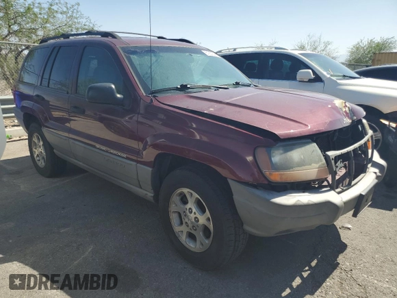 2000 Jeep Grand Cherokee Laredo with VIN 1J4G248S1YC407769, listed as a Copart auction lot 61653545 with 188,882 mi miles and Salvage title. Bid and sale history available at DreamBid. Image 4.