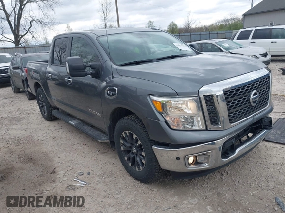 2017 Nissan Titan Platinum Reserve z VIN 1N6AA1E5XHN530256, wystawiony jako IAAI lot #42031654 z przebiegiem 97 200 mil mil oraz . Historia ofert i sprzedaży dostępna na DreamBid. Obrazek 1.