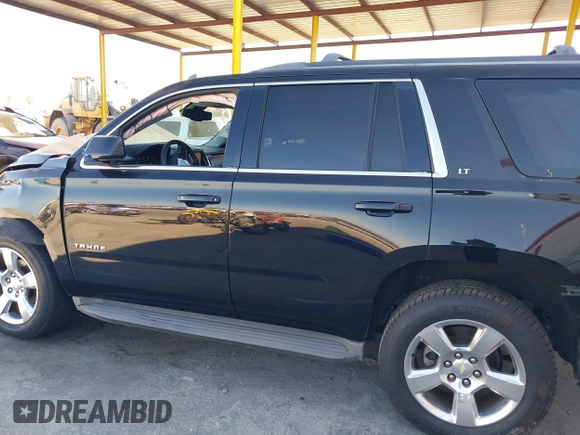 2015 Chevrolet Tahoe LT with VIN 1GNSCBKC6FR188764, listed as a IAAI auction lot 40267671 with 86,663 mi miles and . Bid and sale history available at DreamBid. Image 14.