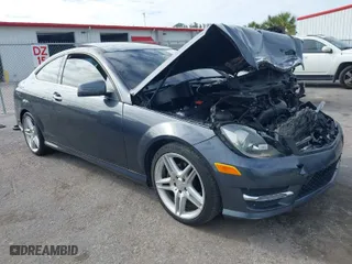 2014 Mercedes-Benz C-Class C 250 with VIN WDDGJ4HBXEG202664, listed as a IAAI auction lot 41348775 with 162,449 mi miles. Bid and sale history available at carsss.com. Image 1.