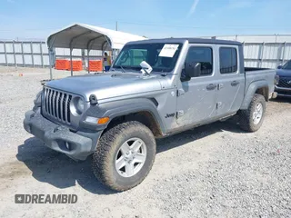 2020 Jeep Gladiator Sport S with VIN 1C6HJTAG7LL128940, listed as a IAAI auction lot 42108154 with 90,596 mi miles and . Bid and sale history available at DreamBid. Image 17.