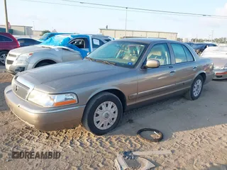 2004 Mercury Grand Marquis GS with VIN 2MEFM74WX4X696703, listed as a IAAI auction lot 42171970 with 149,556 mi miles and . Bid and sale history available at DreamBid. Image 2.
