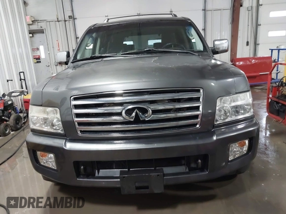 2004 Infiniti QX56 with VIN 5N3AA08C14N812225, listed as a IAAI auction lot 41496326 with 213,916 mi miles. Bid and sale history available at carsss.com. Image 13.