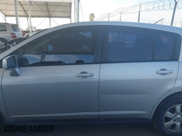 2009 Nissan Versa 1.8 SL with VIN 3N1BC13E29L406619, listed as a IAAI auction lot 41761728 with 115,510 mi miles. Bid and sale history available at carsss.com. Image 15.