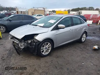 2017 Ford Focus SE with VIN 1FADP3F28HL291757, listed as a IAAI auction lot 41497876 with 72,495 mi miles. Bid and sale history available at carsss.com. Image 2.