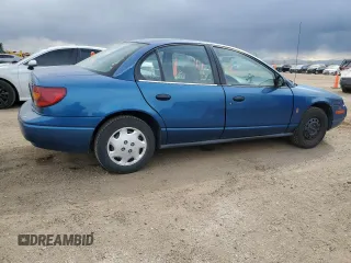 2001 Saturn SL z VIN 1G8ZH54811Z357837, wystawiony jako Copart lot #55210895 z przebiegiem 217 799 mil mil oraz Nie do naprawy. Historia ofert i sprzedaży dostępna na DreamBid. Obrazek 3.