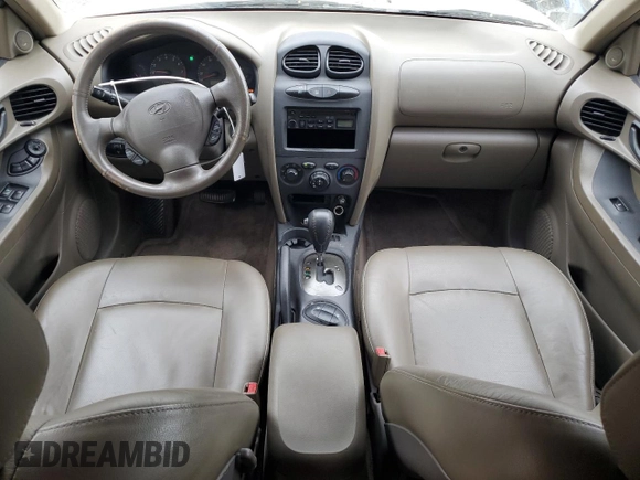 2001 Hyundai Santa Fe GLS with VIN KM8SC83D71U084837, listed as a Copart auction lot 77588984 with 102,585 mi miles and Salvage Title. Bid and sale history available at carsss.com. Image 8.