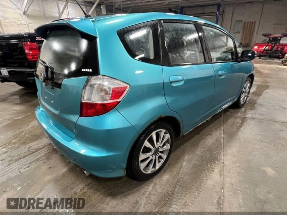 2013 Honda Fit Sport with VIN JHMGE8H58DC044846, listed as a IAAI auction lot 42201605 with 198,546 mi miles. Bid and sale history available at carsss.com. Image 4.