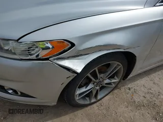 2014 Ford Fusion Titanium with VIN 3FA6P0K93ER163045, listed as a IAAI auction lot 42023862 with 171,543 mi miles. Bid and sale history available at carsss.com. Image 6.