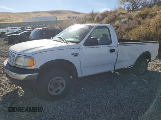1999 Ford F-150 with VIN 1FTRF18W1XKA87801, listed as a Copart auction lot 79094454 with Not provided miles and Salvage title. Bid and sale history available at DreamBid. Image 1.
