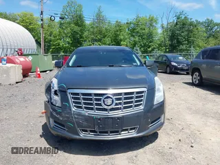 2013 Cadillac XTS Luxury z VIN 2G61R5S33D9101434, wystawiony jako IAAI lot #42290199 z przebiegiem 48 075 mil mil oraz . Historia ofert i sprzedaży dostępna na DreamBid. Obrazek 12.