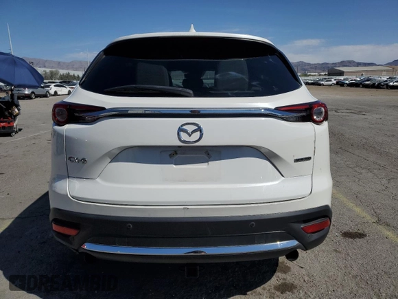 2021 Mazda CX-9 Carbon Edition с VIN JM3TCADY4M0500010, выставлен на аукционе Copart как лот 53283005 с пробегом 55 762 миль миль и Списание • Salvage title. История ставок и продаж доступна на DreamBid. Изображение 6.
