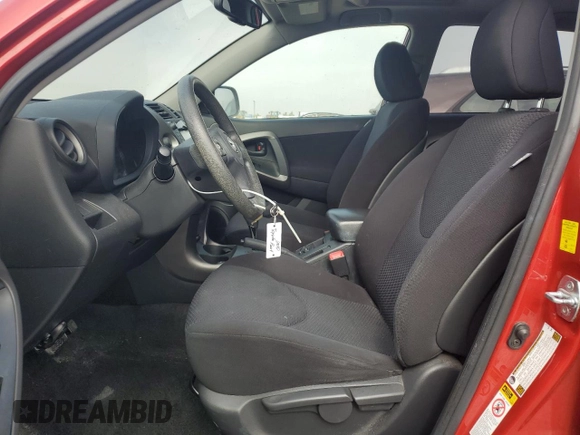 2010 Toyota RAV4 Sport with VIN JTMWF4DVXA5018466, listed as a Copart auction lot 62747385 with 180,769 mi miles and Salvage title. Bid and sale history available at DreamBid. Image 7.