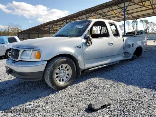 2003 Ford F-150 XL with VIN 1FTRX07W03KB17955, listed as a Copart auction lot 83061424 with 164,529 mi miles and Salvage Title. Bid and sale history available at carsss.com. Image 1.