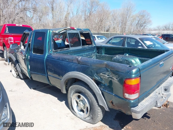 1999 Ford Ranger XLT with VIN 1FTZR15X0XPA00817, listed as a IAAI auction lot 41855947 with 215,786 mi miles. Bid and sale history available at carsss.com. Image 12.
