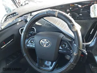 2021 Toyota Prius Prime LE with VIN JTDKAMFP1M3183950, listed as a IAAI auction lot 41526295 with 69,727 mi miles. Bid and sale history available at carsss.com. Image 7.