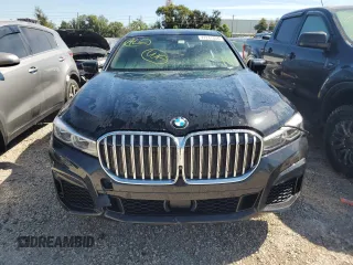 2020 BMW 7 Series 750i xDrive with VIN WBA7U2C0XLGM27270, listed as a Copart auction lot 77241404 with 68,998 mi miles and Salvage Title. Bid and sale history available at carsss.com. Image 5.