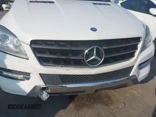 2013 Mercedes-Benz M 350 z VIN 4JGDA5HB8DA119427, wystawiony jako IAAI lot #42365130 z przebiegiem 163 132 mil mil oraz . Historia ofert i sprzedaży dostępna na DreamBid. Obrazek 6.