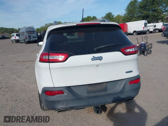 2015 Jeep Cherokee Latitude with VIN 1C4PJLCS6FW689607, listed as a IAAI auction lot 42103286 with 142,479 mi miles. Bid and sale history available at carsss.com. Image 16.