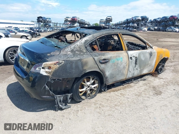 2014 Nissan Maxima S with VIN 1N4AA5AP5EC477030, listed as a IAAI auction lot 42104484 with 116,035 mi miles and . Bid and sale history available at DreamBid. Image 4.