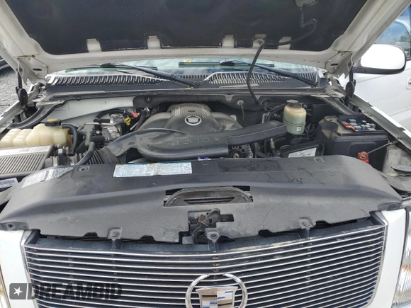 2002 Cadillac Escalade z VIN 1GYEK63N42R110276, wystawiony jako Copart lot #52862665 z przebiegiem Nie podano mil oraz Szkoda całkowita • Salvage title. Historia ofert i sprzedaży dostępna na DreamBid. Obrazek 12.
