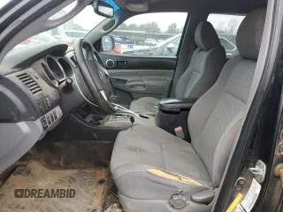 2012 Toyota Tacoma with VIN 5TFLU4EN8CX028993, listed as a Copart auction lot 43585645 with 306,372 mi miles and Salvage title. Bid and sale history available at DreamBid. Image 7.