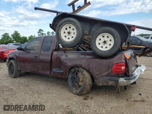 2000 Ford F-150 XL with VIN 1FTRX07W1YKA05317, listed as a Copart auction lot 56207955 with 282,785 mi miles and Salvage title. Bid and sale history available at DreamBid. Image 2.