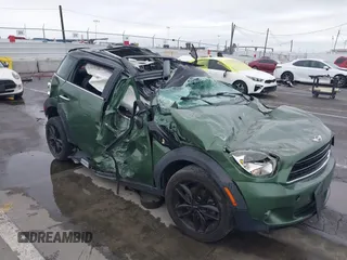 2015 MINI Countryman z VIN WMWZB3C59FWR43209, wystawiony jako IAAI lot #41761218 z przebiegiem Nie podano mil oraz . Historia ofert i sprzedaży dostępna na DreamBid. Obrazek 1.