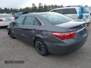 2016 Toyota Camry XLE with VIN 4T1BF1FK2GU127790, listed as a IAAI auction lot 41289837 with 151,636 mi miles and . Bid and sale history available at carsss.com. Image 3.