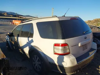2008 Ford Taurus X SEL z VIN 1FMDK05W38GA32822, wystawiony jako IAAI lot #41630130 z przebiegiem Nie podano mil oraz . Historia ofert i sprzedaży dostępna na DreamBid. Obrazek 14.