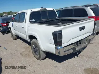 2021 Toyota Tacoma SR with VIN 3TYAX5GN6MT016452, listed as a IAAI auction lot 41816457 with 30,617 mi miles and . Bid and sale history available at DreamBid. Image 3.