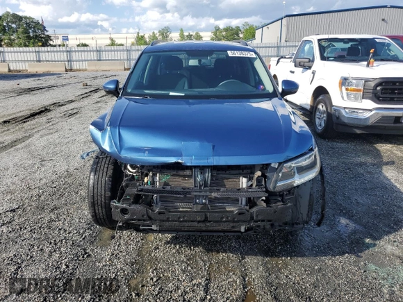2018 Volkswagen Tiguan S with VIN 3VV0B7AX2JM019924, listed as a Copart auction lot 56138375 with 76,798 mi miles and Salvage title. Bid and sale history available at DreamBid. Image 5.