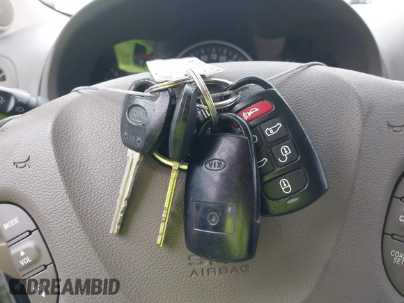 2012 Kia Sedona EX with VIN KNDMH4C76C6457908, listed as a IAAI auction lot 42179927 with 196,104 mi miles and . Bid and sale history available at DreamBid. Image 11.