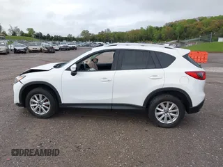 2016 Mazda CX-5 Touring with VIN JM3KE4CY0G0903723, listed as a IAAI auction lot 41966516 with 107,569 mi miles. Bid and sale history available at carsss.com. Image 14.