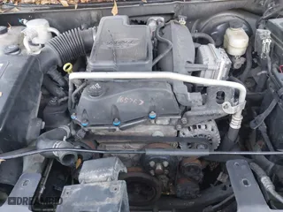 2005 GMC Envoy SLE with VIN 1GKDS13S352215032, listed as a IAAI auction lot 41221612 with 260,647 mi miles. Bid and sale history available at carsss.com. Image 10.