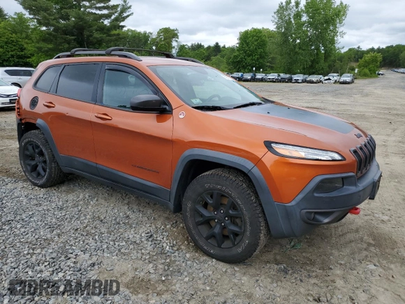2016 Jeep Cherokee Trailhawk with VIN 1C4PJMBS2GW255368, listed as a Copart auction lot 59010305 with 105,667 mi miles and Salvage title. Bid and sale history available at DreamBid. Image 4.