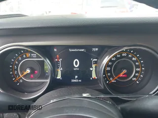 2023 Jeep Gladiator Sport S z VIN 1C6HJTAG4PL544871, wystawiony jako IAAI lot #42382428 z przebiegiem 33 453 mil mil oraz . Historia ofert i sprzedaży dostępna na DreamBid. Obrazek 7.