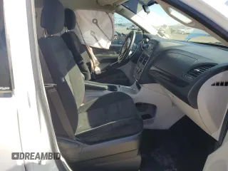 2014 Dodge Grand Caravan SXT with VIN 2C4RDGCG8ER283953, listed as a Copart auction lot 53002295 with Not Provided miles and Salvage Title. Bid and sale history available at DreamBid. Image 7.