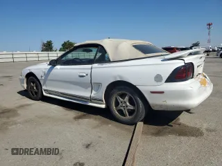 1998 Ford Mustang with VIN 1FAFP4448WF269580, listed as a Copart auction lot 54861155 with 304,869 mi miles and Salvage title. Bid and sale history available at DreamBid. Image 2.