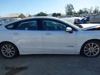 2018 Ford Fusion SE z VIN 3FA6P0LU3JR102971, wystawiony jako IAAI lot #41814321 z przebiegiem 135 472 mil mil oraz . Historia ofert i sprzedaży dostępna na DreamBid. Obrazek 13.