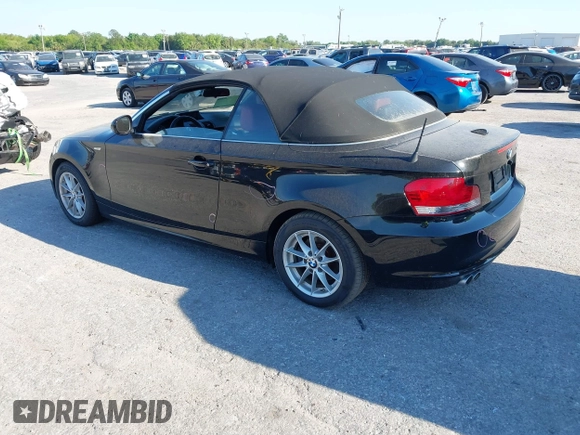 2011 BMW 1 Series 128i with VIN WBAUL7C55BVM81049, listed as a IAAI auction lot 41892811 with 50,659 mi miles and . Bid and sale history available at carsss.com. Image 3.