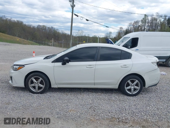 2019 Subaru Impreza with VIN 4S3GKAA6XK3607624, listed as a IAAI auction lot 42005570 with 136,026 mi miles and . Bid and sale history available at DreamBid. Image 14.