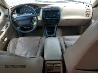 1998 Ford Explorer with VIN 1FMZU32X7WZB87549, listed as a Copart auction lot 60970165 with 186,022 mi miles and Salvage title. Bid and sale history available at DreamBid. Image 8.