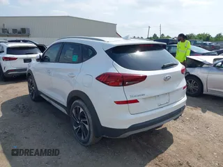 2019 Hyundai Tucson Sport with VIN KM8J33AL1KU861698, listed as a IAAI auction lot 42129173 with 100,160 mi miles. Bid and sale history available at carsss.com. Image 3.