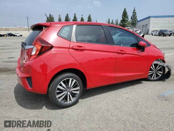 2015 Honda Fit EX-L with VIN 3HGGK5H87FM701108, listed as a Copart auction lot 55536945 with 57,519 mi miles and Salvage title. Bid and sale history available at DreamBid. Image 3.