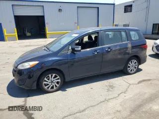2014 Mazda 5 Sport z VIN JM1CW2BL5E0177052, wystawiony jako Copart lot #60497145 z przebiegiem 97 895 mil mil oraz Szkoda całkowita • Salvage title. Historia ofert i sprzedaży dostępna na DreamBid. Obrazek 1.