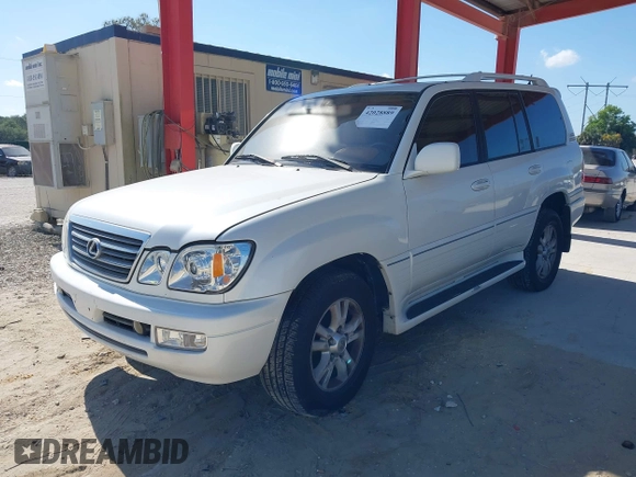 2003 Lexus LX 470 with VIN JTJHT00WX33523623, listed as a IAAI auction lot 42028889 with 317,700 mi miles and . Bid and sale history available at DreamBid. Image 17.