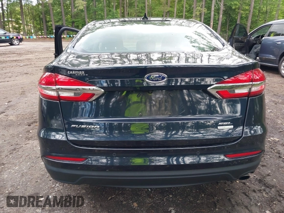 2020 Ford Fusion SEL with VIN 3FA6P0CD1LR180409, listed as a IAAI auction lot 42384311 with 39,163 mi miles and . Bid and sale history available at DreamBid. Image 16.